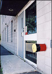 Photo of a dry hydrant adapter installed in a fire station.